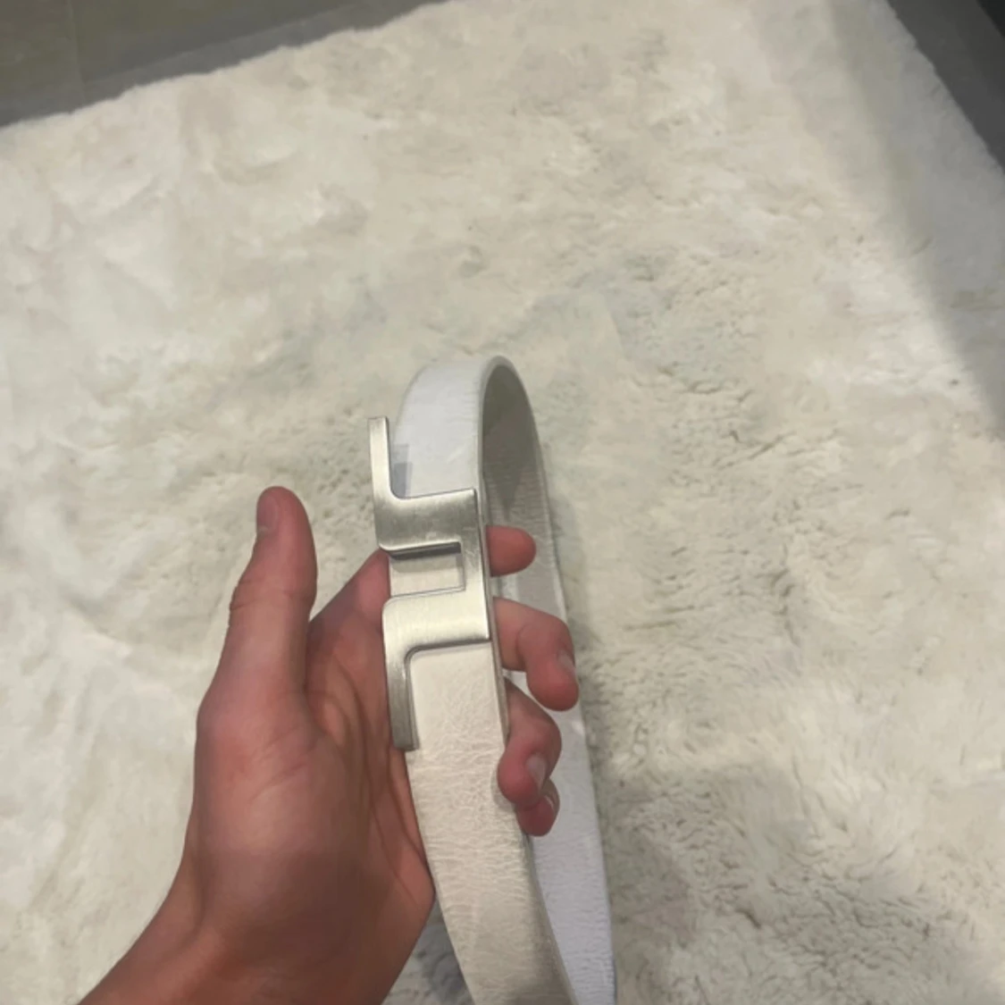 Vit bälte från J.lindberg.