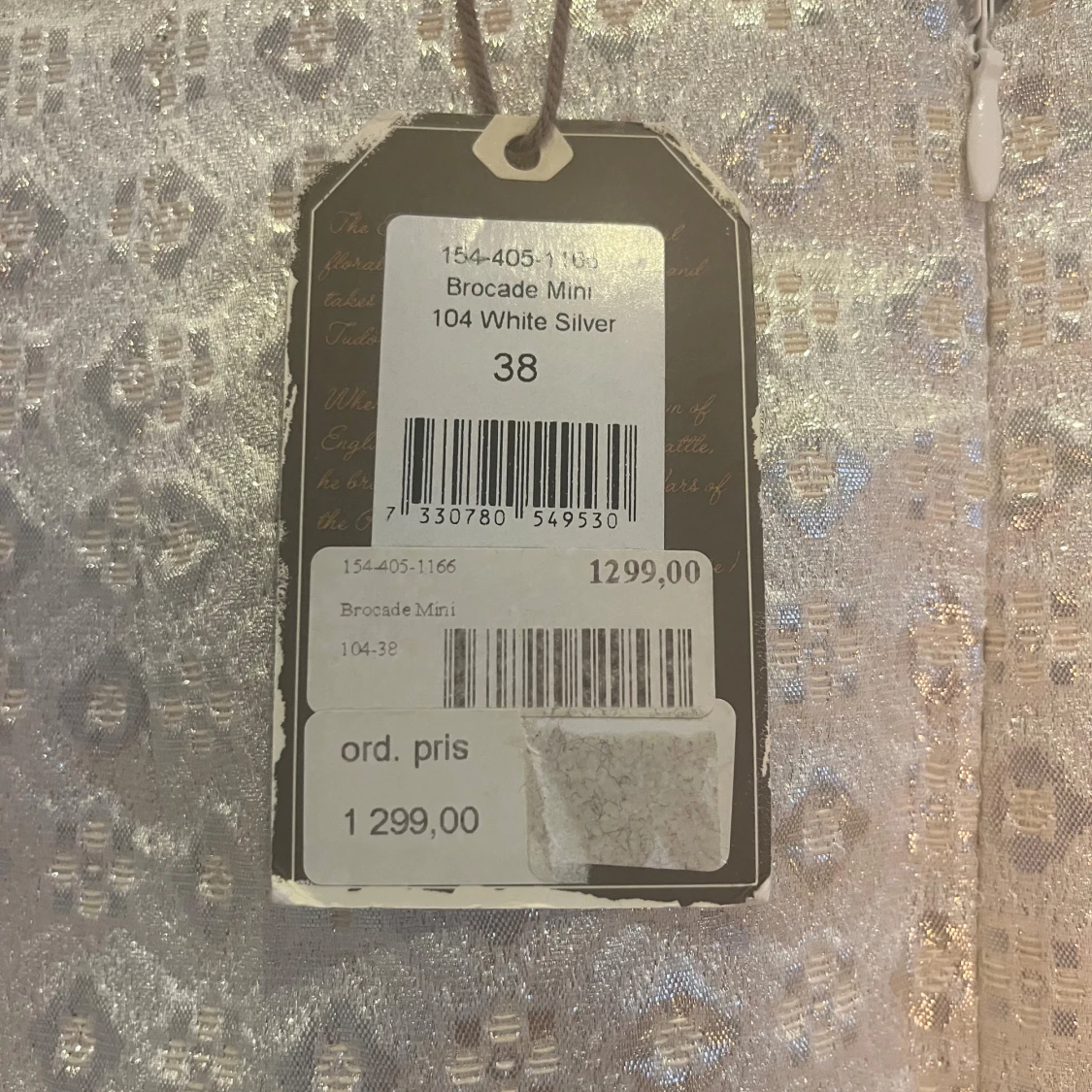 Vit och silver brokad minikjol - 2