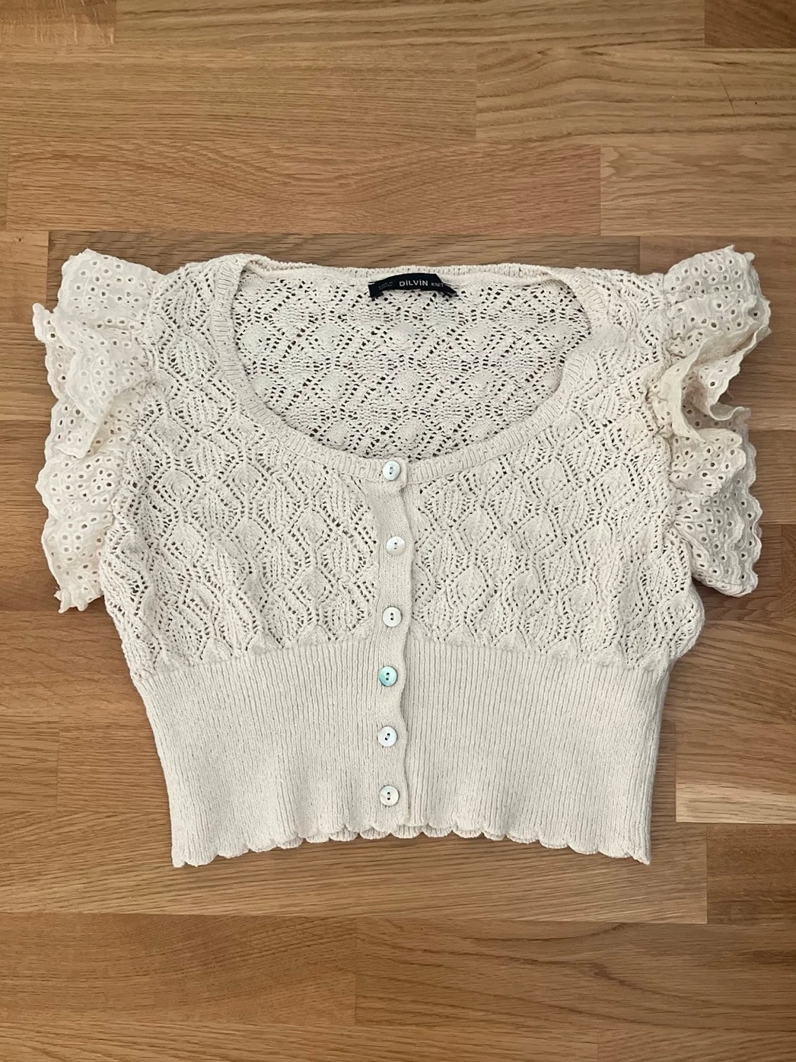 stickad bolero topp från Dilvin