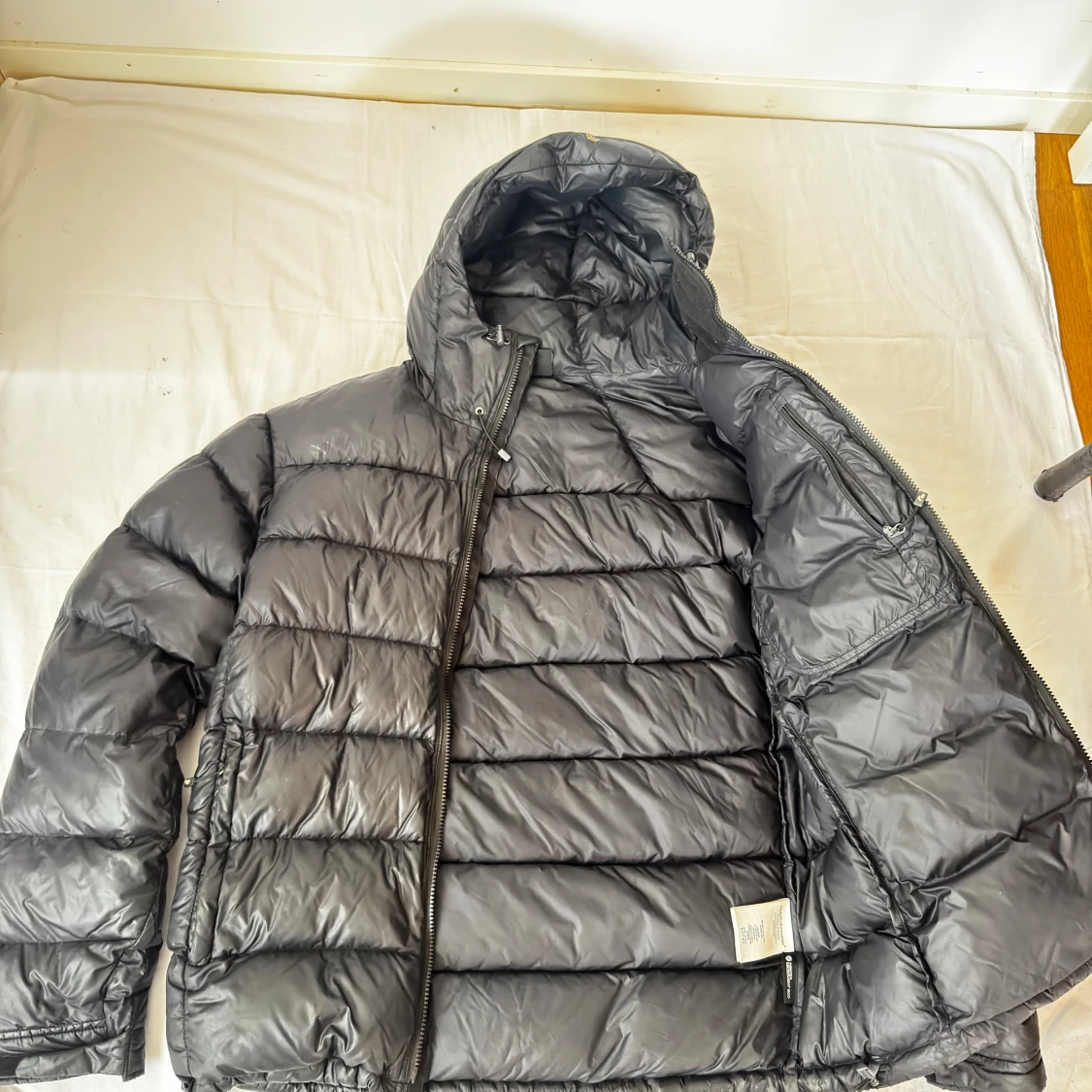 Svart dunjacka Peak Performance storlek L - 2