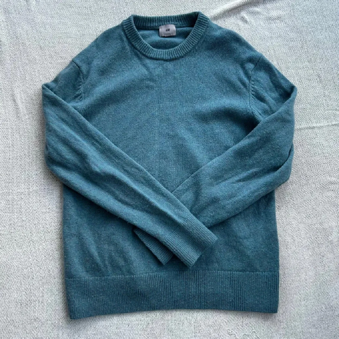 Blå stickad tröja från H&M