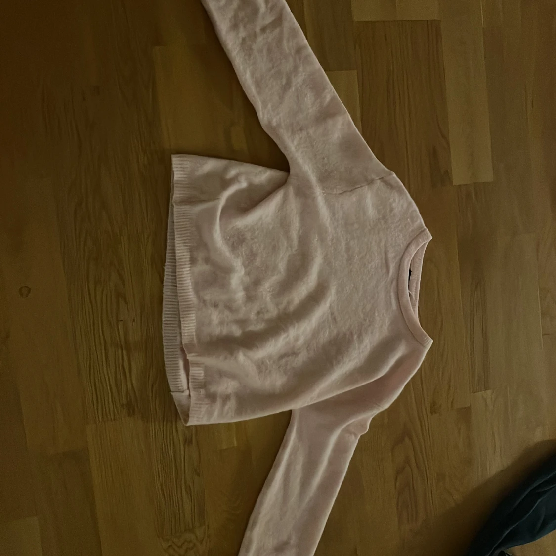 Ljusrosa stickad tröja