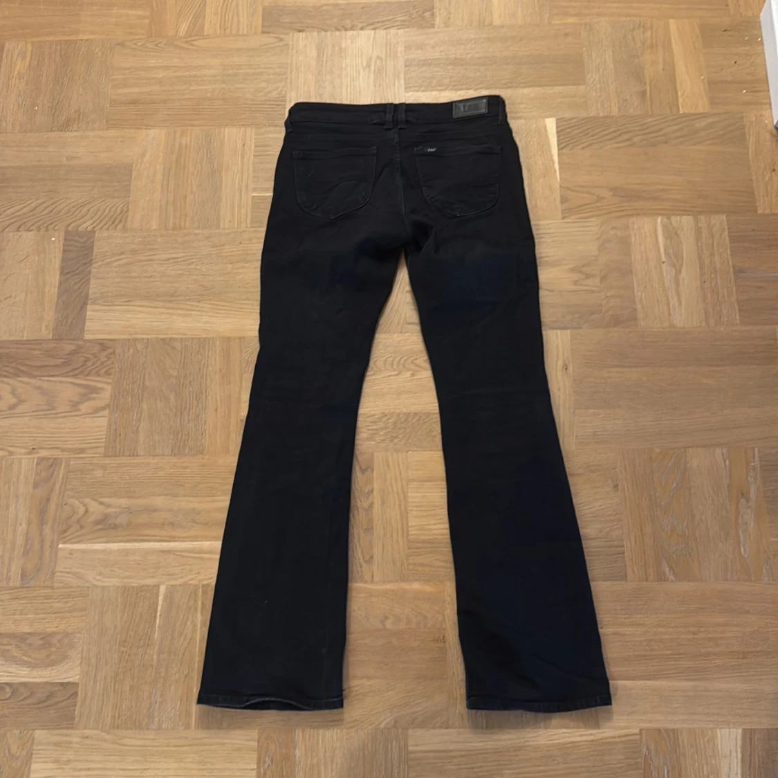 Svarta lågmidjade, bootcut jeans från Lee - 1