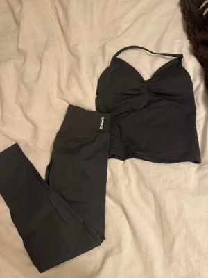 dfyne impact sett mörk grå - säljer mitt fina dfyne sett i färgen slate gray💗 aldrig använt den, storlek S!