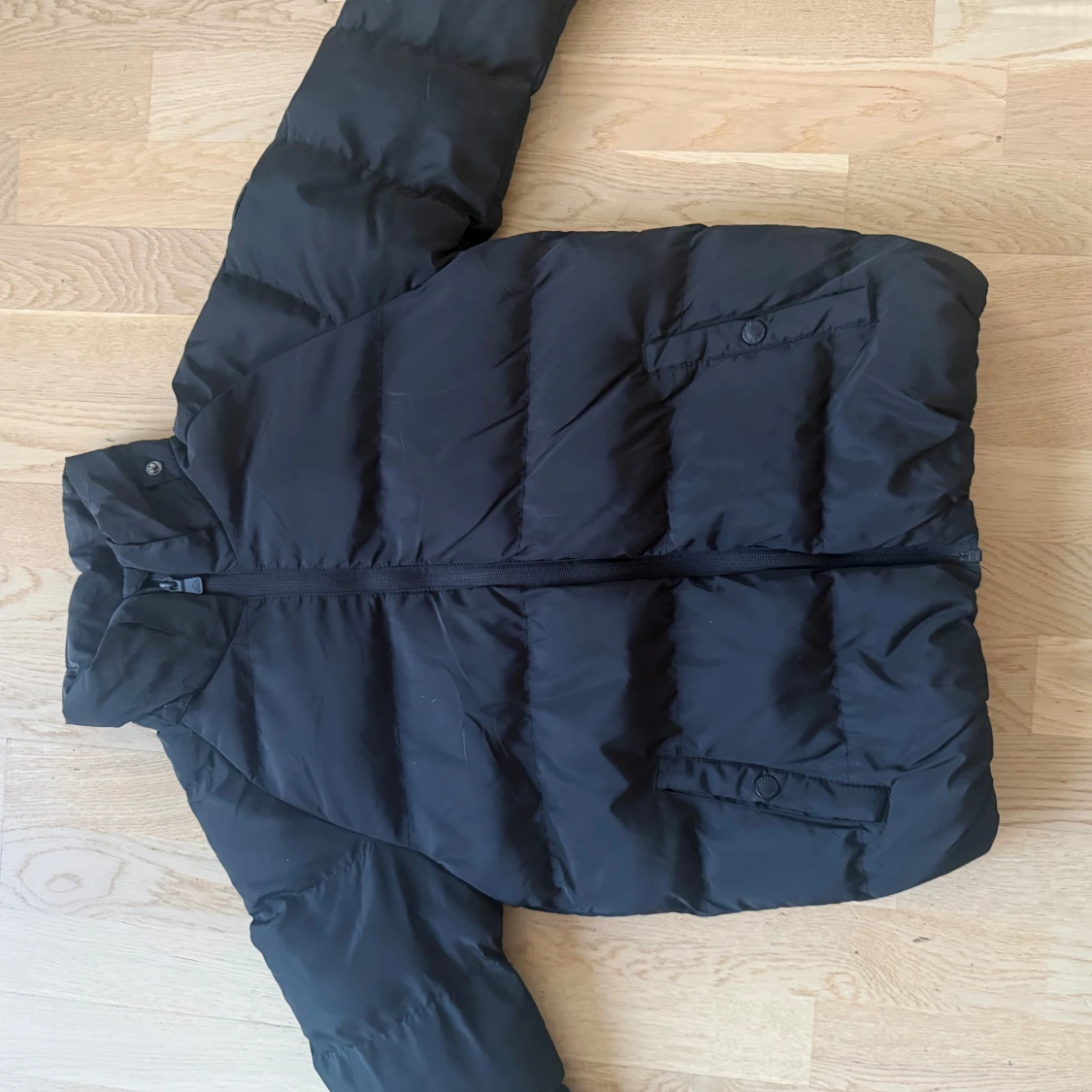 Svart pufferjacka från McKinley