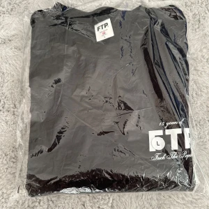 FTP 15 Year Anniversary Tee Black - Helt ny endast öppnad förpackning men ligger kvar i påsen. Aldrig använd bara testad storlek L.