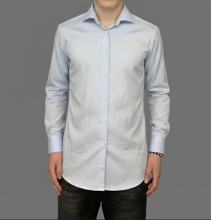 Eton skjorta ljusblå  - Väldigt snygg Eton skjorta i en ljusblå färg. Skjortan sitter bra på mig och jag är 188 cm lång😁✅ skjortan är i nytt skick och har inga större tecken på användning. Vid frågor/prisförslag tveka inte med att höra av dig. Följare får alltid bättre pris🙌😇 kolla även in flera liknande och exklusiva plagg i min profil🤌storleken är 42 slim 16 1/2🫡