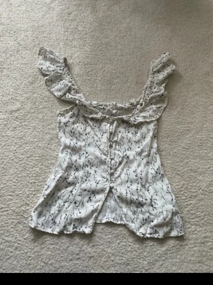 Volang topp - Topp från H&M. Storlek xs.