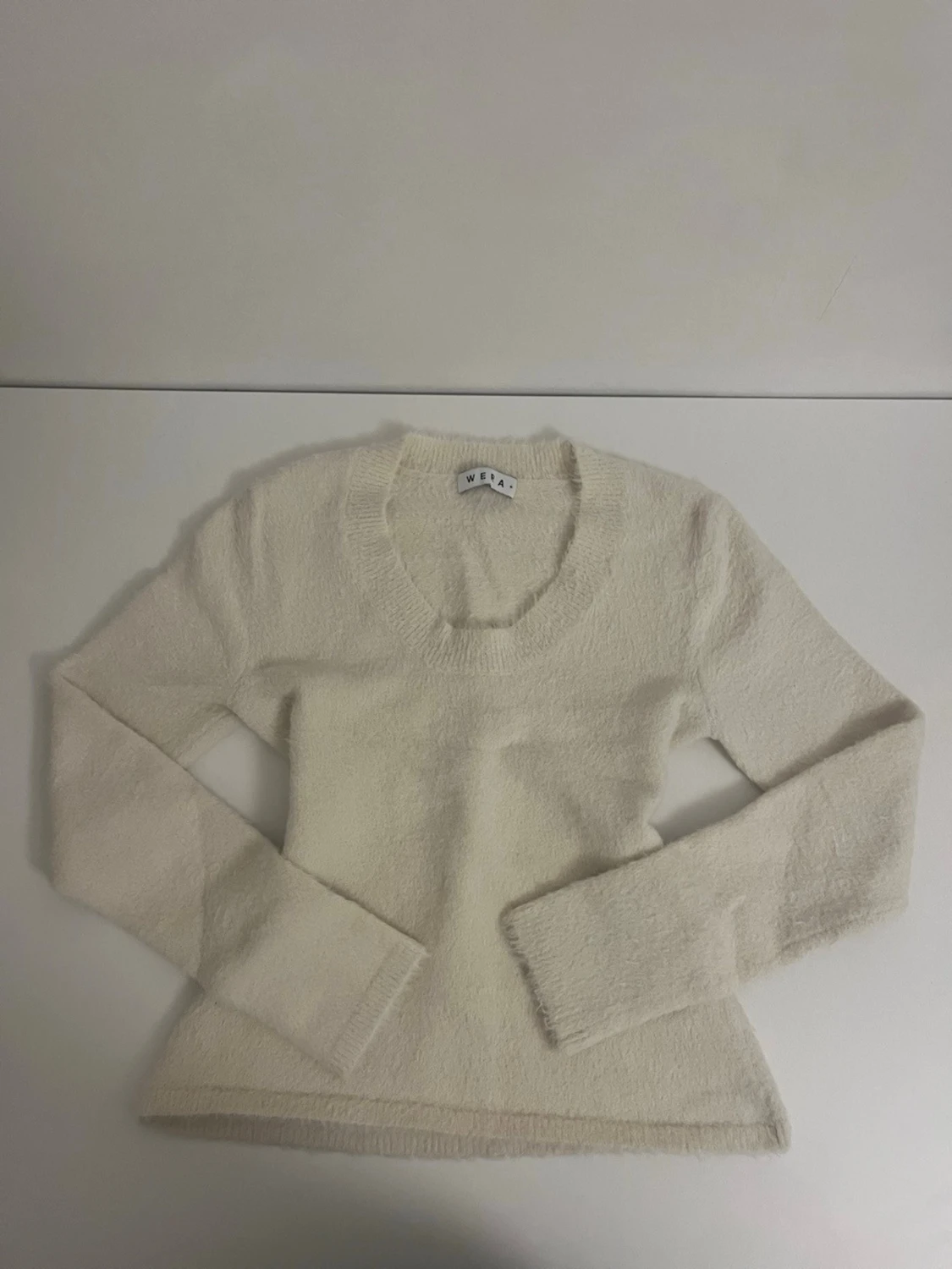 Uringad stickad tröja