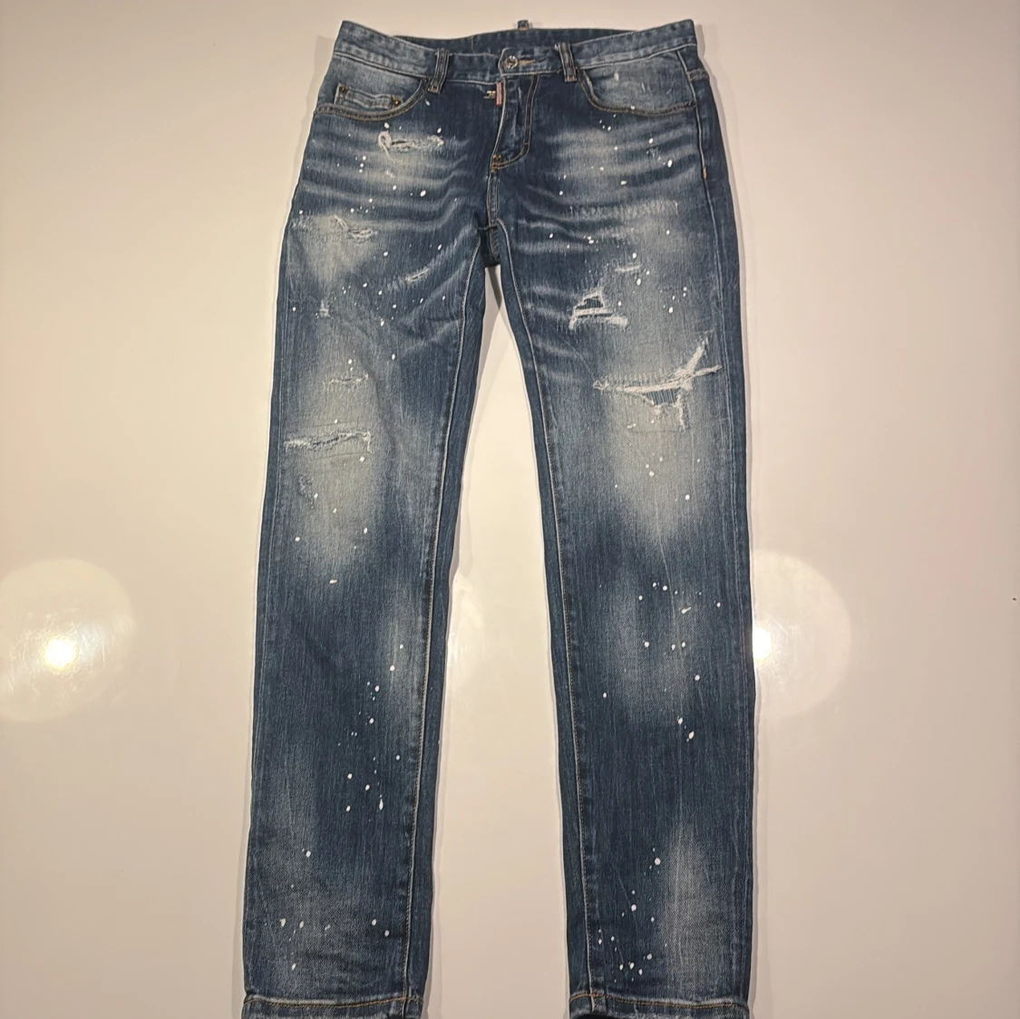 Dsquared2 blå jeans med slitningar