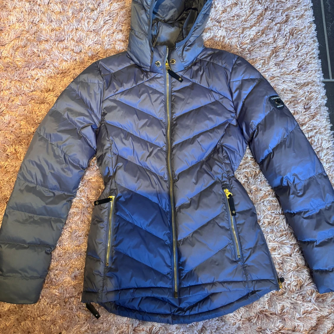 Grå dunjacka från Canada Snow