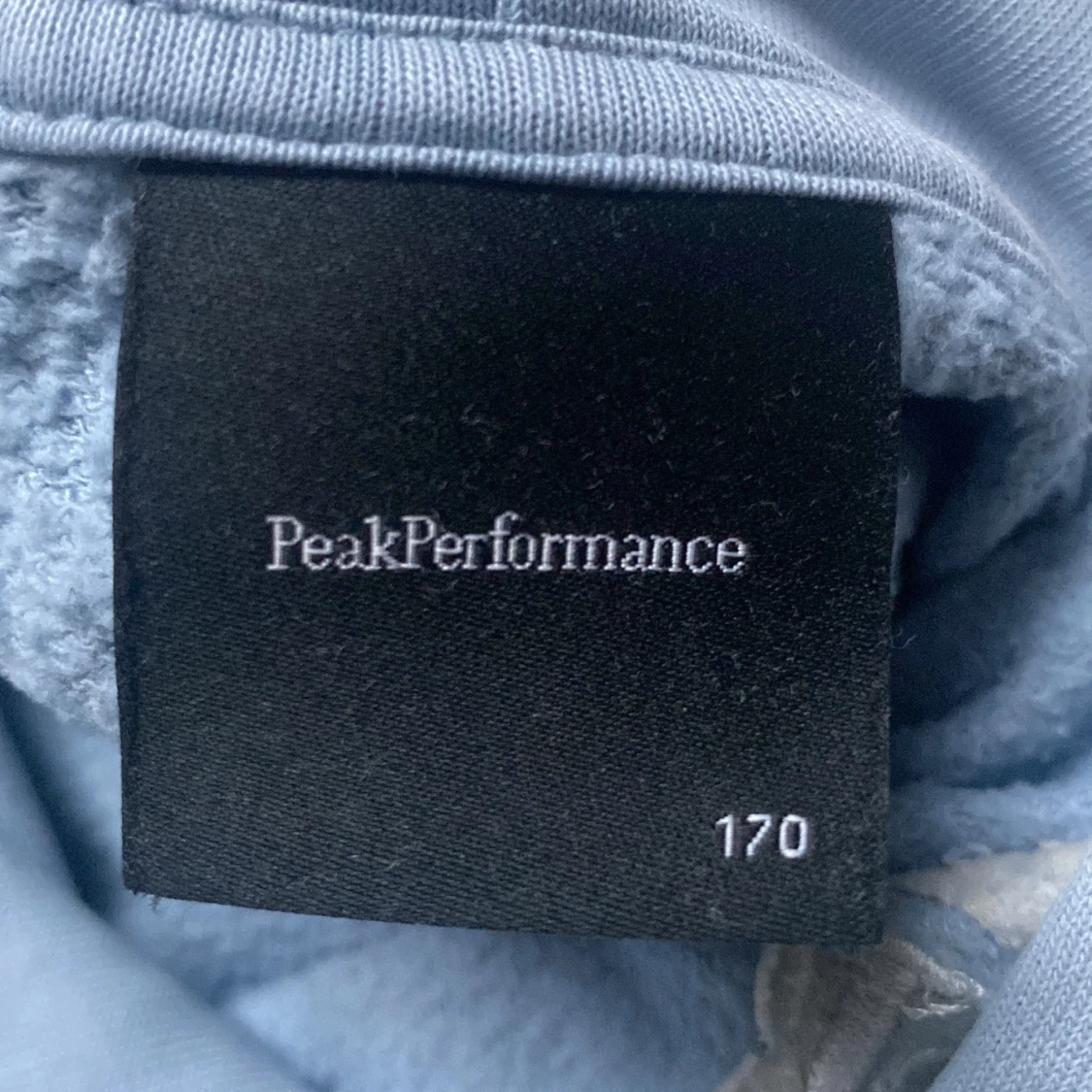 Ljusblå hoodie från Peak Performance - 2