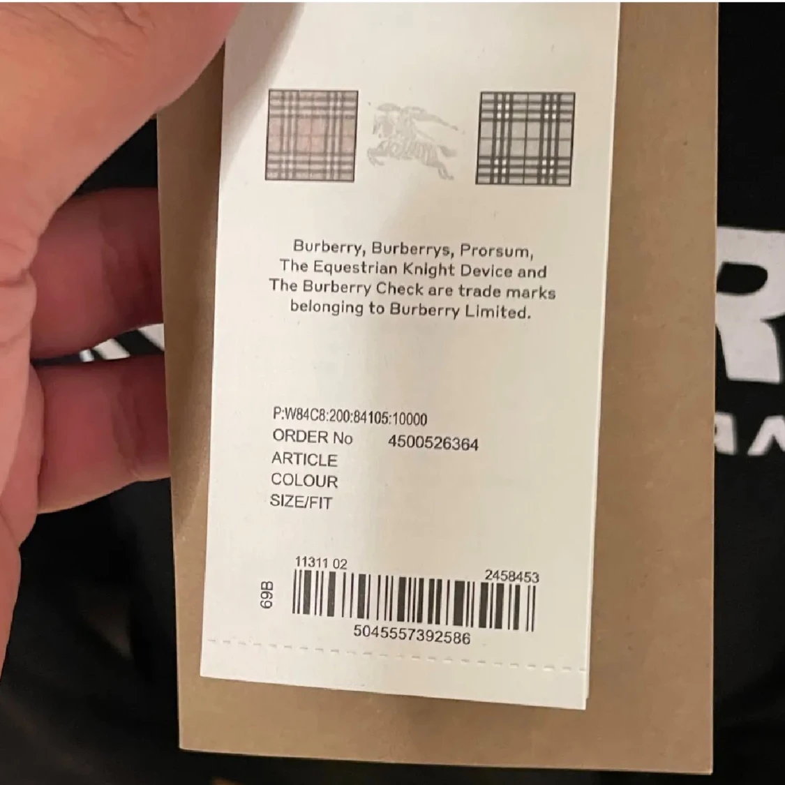 Svart hoodie från Burberry med tryck - 1