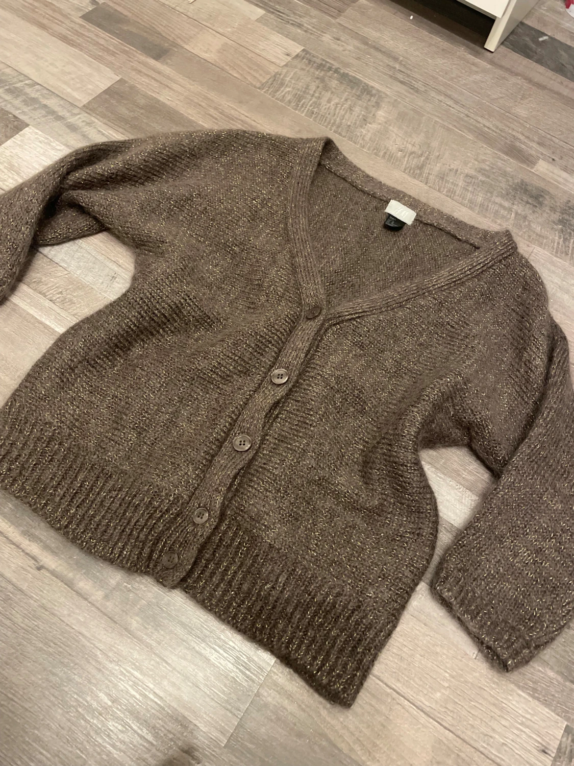 Brun glittrig kofta från H&M