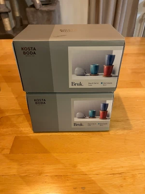 Muggar  - Muggar från kosta Boda. Dom är helt nya oanvända. Finns fyra stycken 