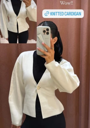 Kofta med knapp - Använd en gång