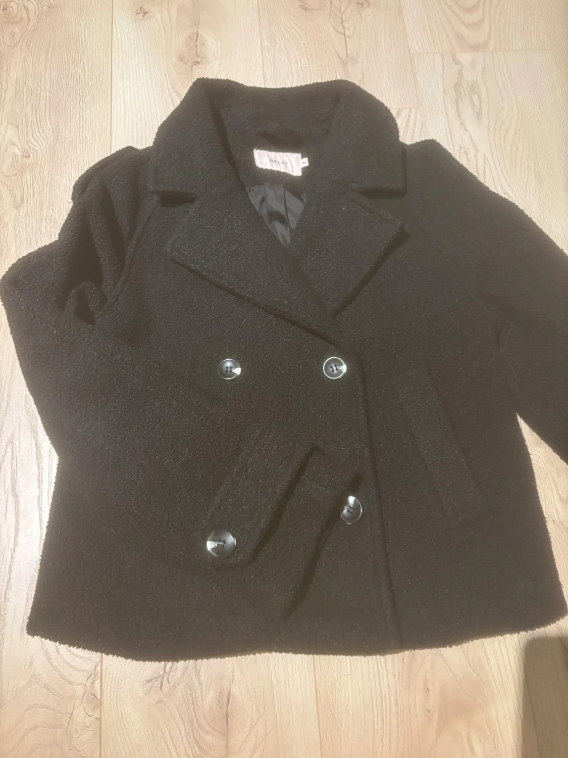 Svart teddyjacka/kappa från Nelly - 2