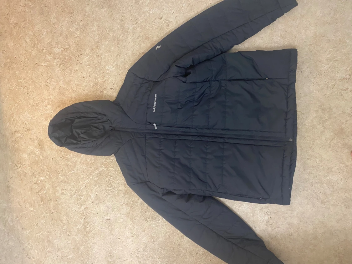 Svart pufferjacka Peak Performance