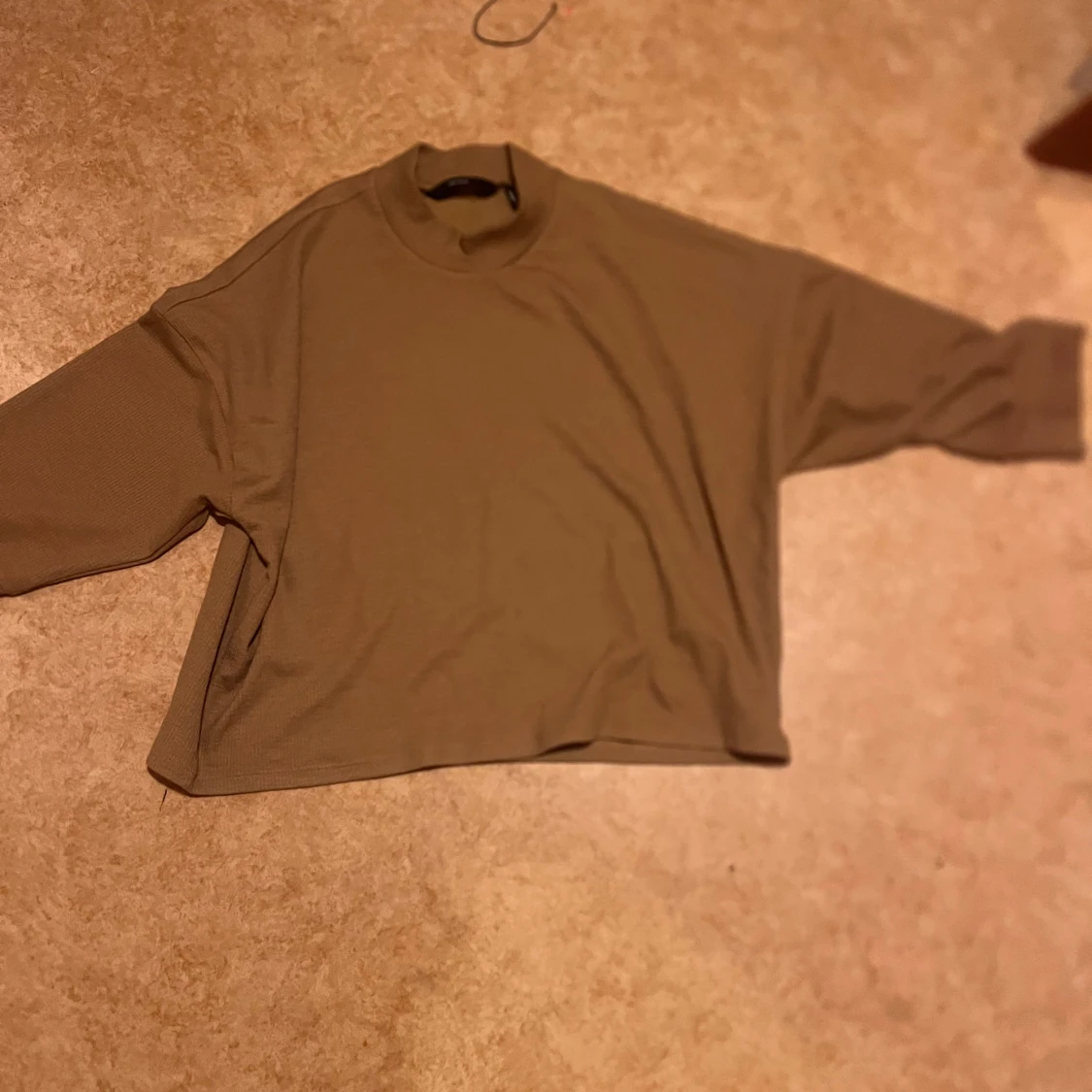 Beige polotröja från Vero Moda