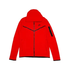 Röd jacka från Nike - Säljer en snygg röd jacka från Nike med dragkedja och svarta detaljer. Perfekt för höst och vår. Jackan har en normal passform och långa ärmar. Den är gjord i ett syntetmaterial som är både bekvämt och hållbart. Perfekt för träning eller vardagsbruk!