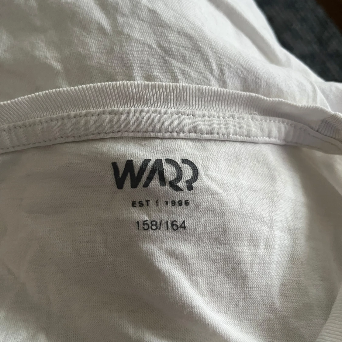 Vit t-shirt med tryck från Warp - 91