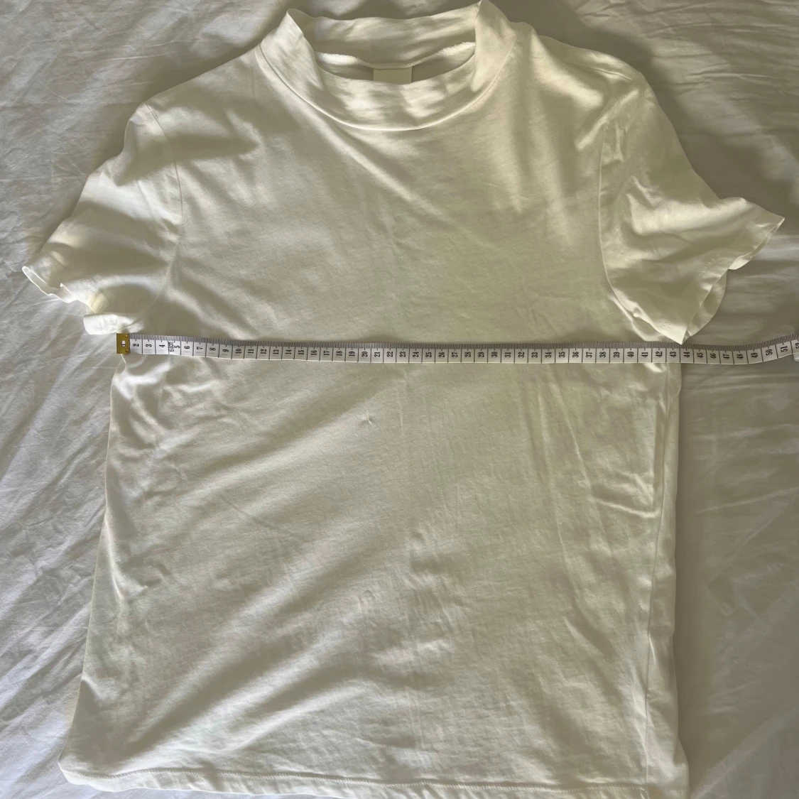 Vit mock neck t-shirt med hög krage - 90