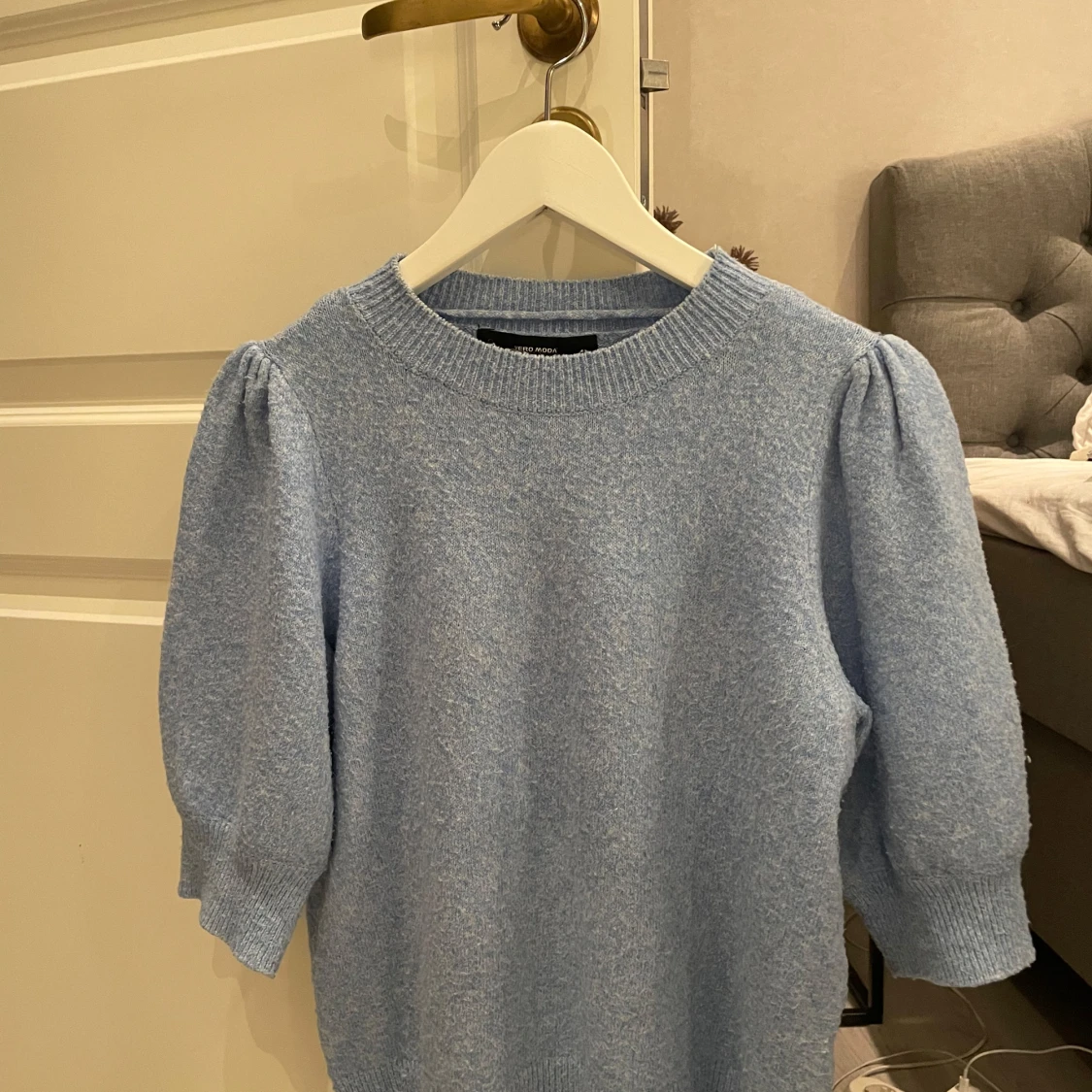 Ljusblå stickad t-shirt - 91