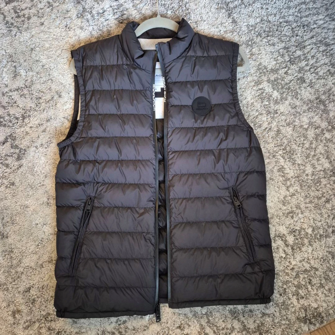 Svart dunväst från Woolrich - 90