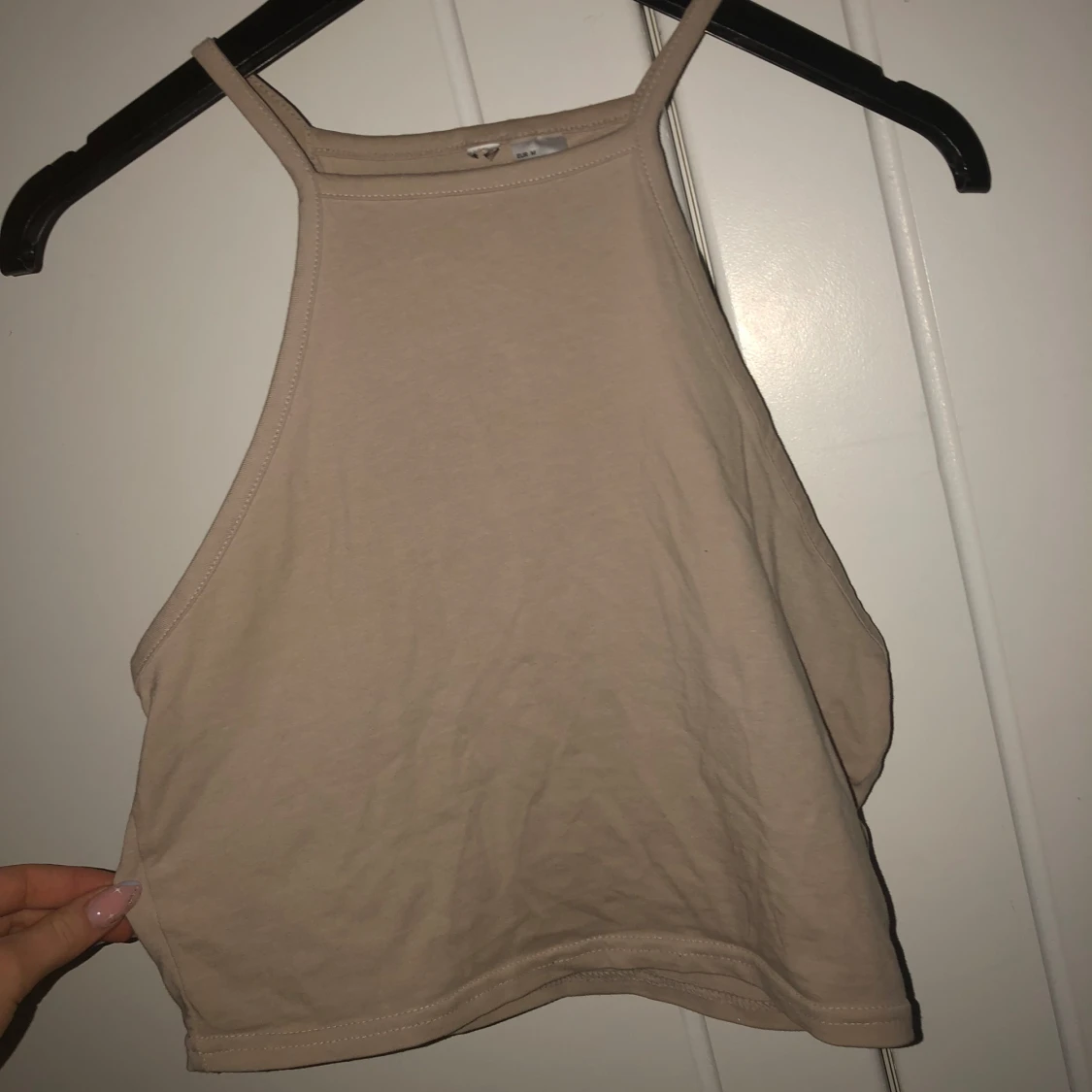 Beige ärmlös linnetopp