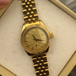 Mockberg Royal Gold klocka - Mockberg klocka i guld, modellen Royal. Använd några enstaka gånger