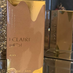 Lattafa Eclaire   - Säljer en ny parfym från Lattafa, Eclaire 100ml. Kartongen är fortfarande oöppnad och inplastad. 