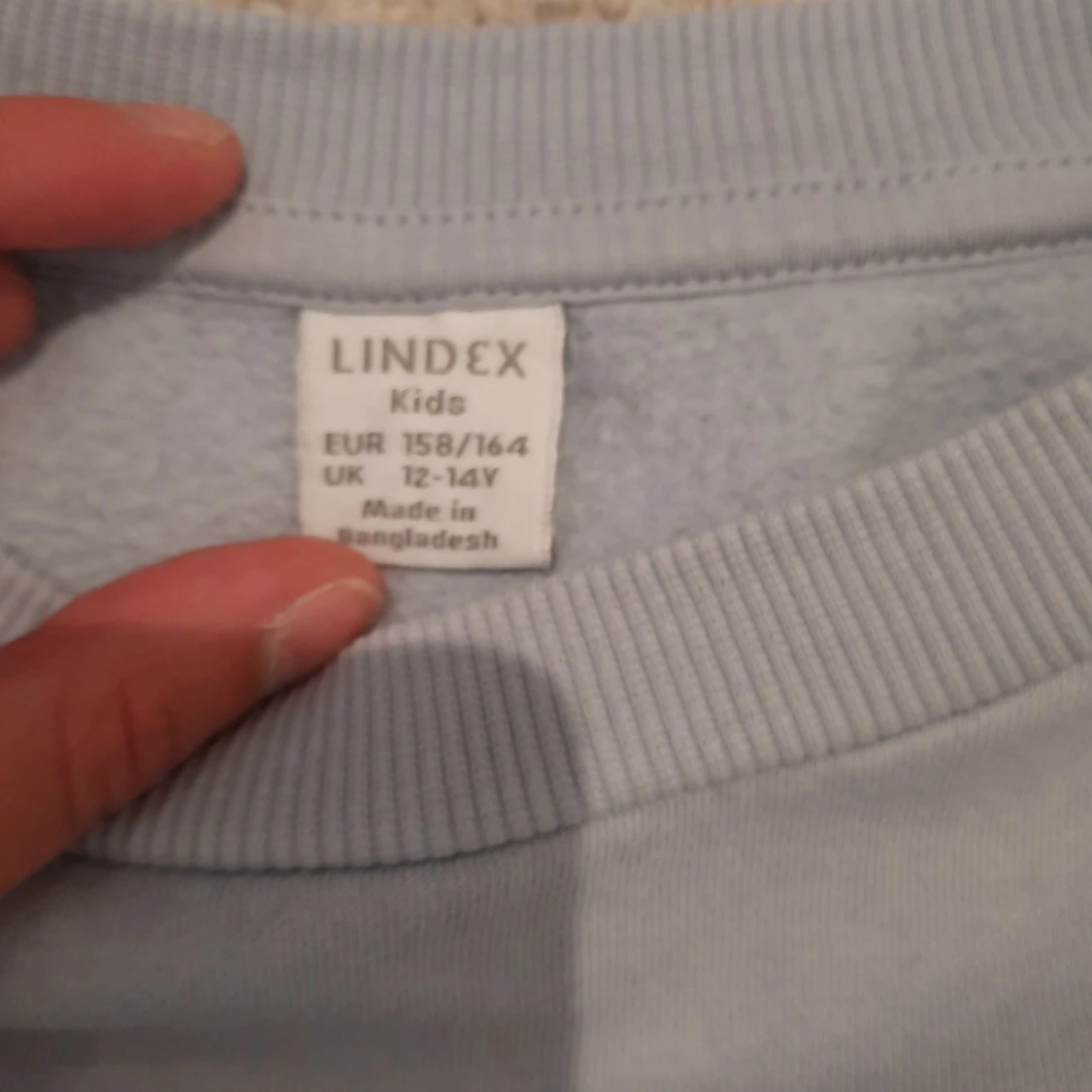 Ljusblå sweatshirt - 91