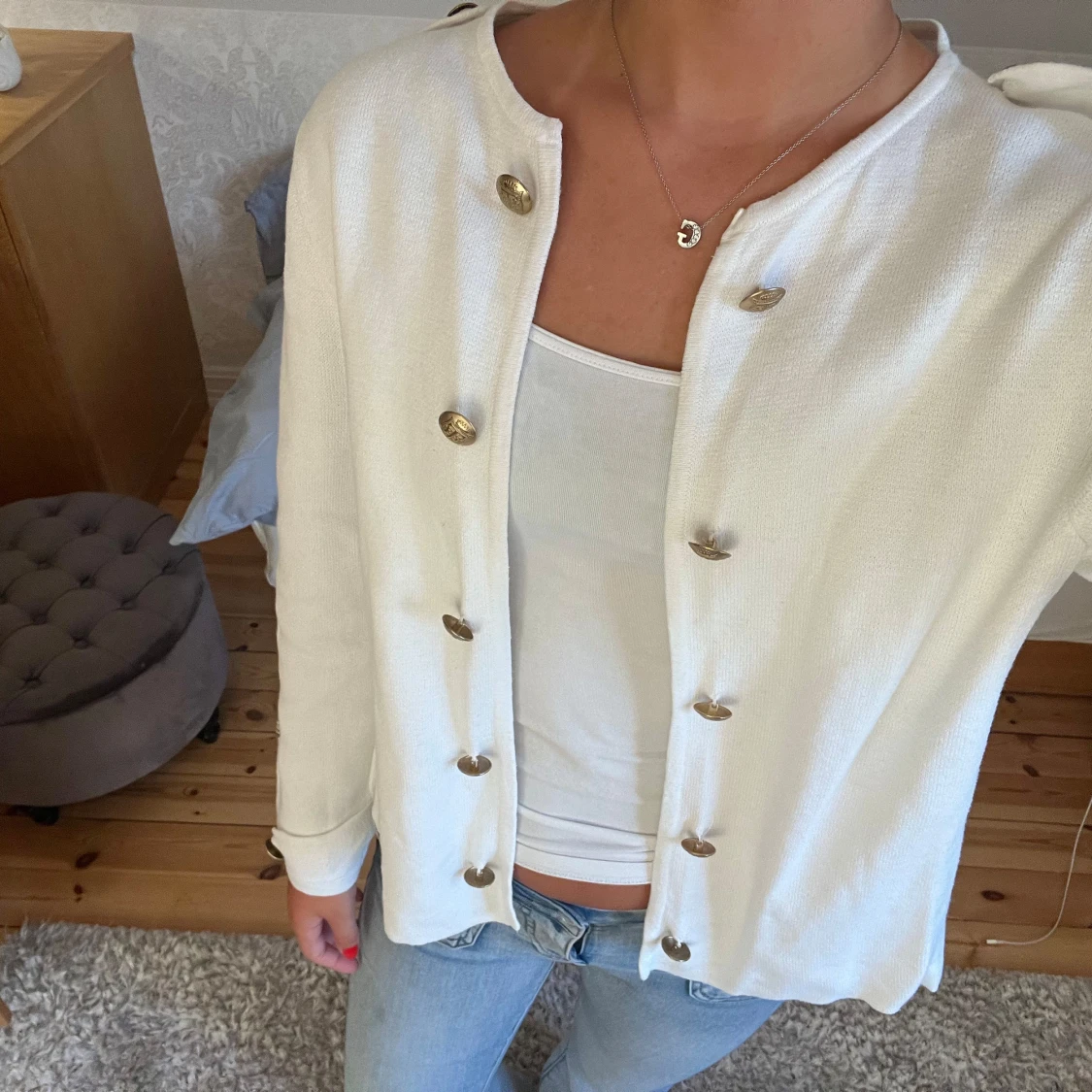 Kofta med guldknappar!