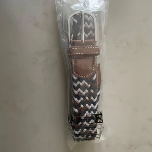 Flätad bälte  - Grisch