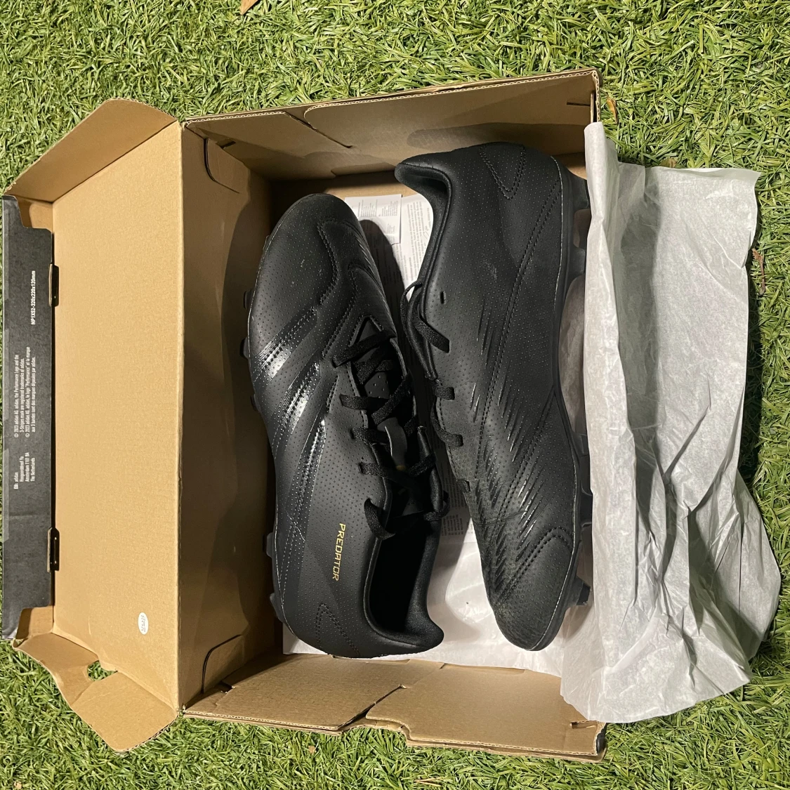 Svarta Fotbolls skor