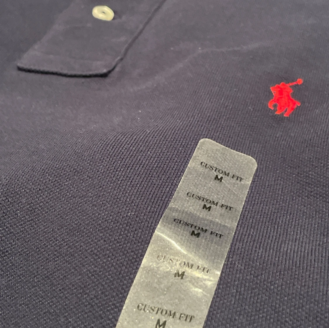 Mörkblå pikétröja från Ralph Lauren - 1