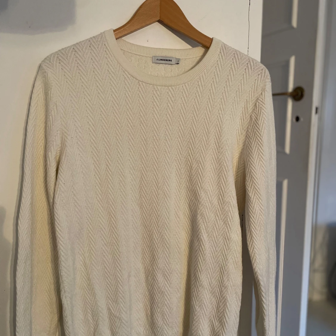Vit stickad tröja från J.Lindeberg