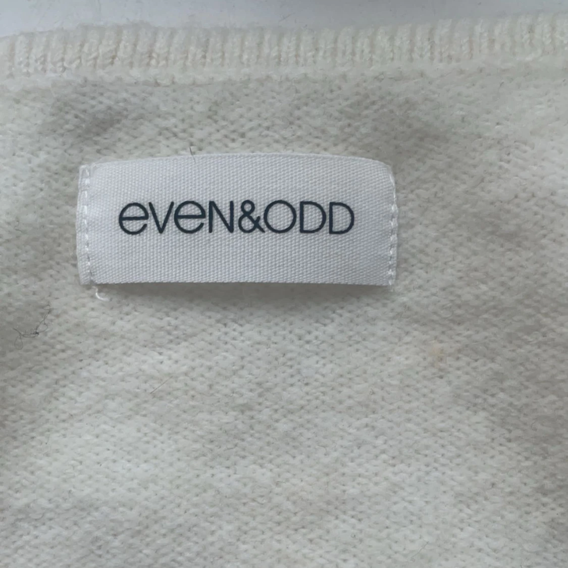 Vit kofta med rosett  - 3