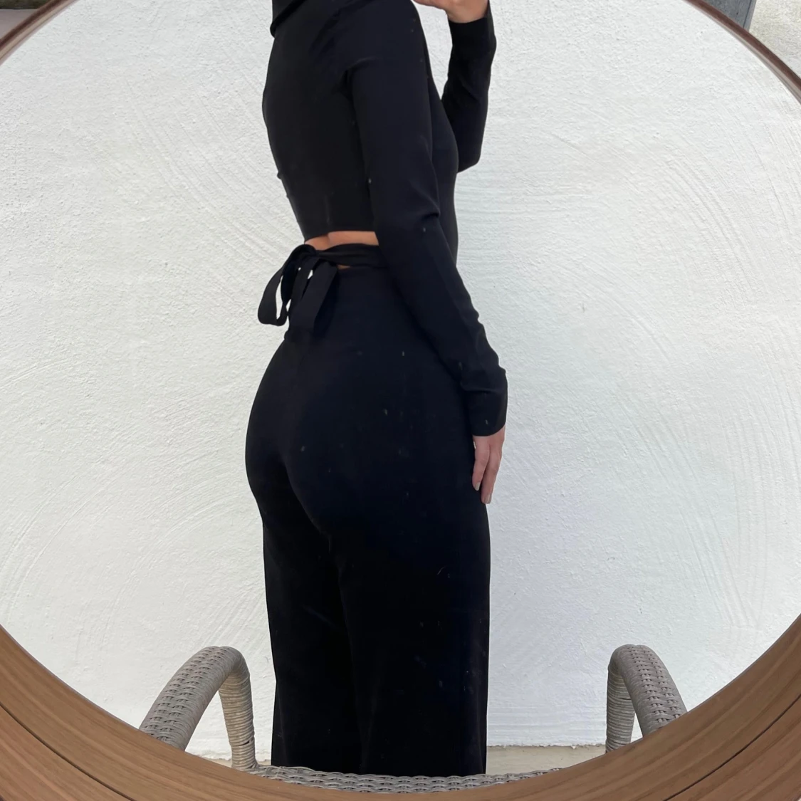 Svart byxdress med knappar - 90