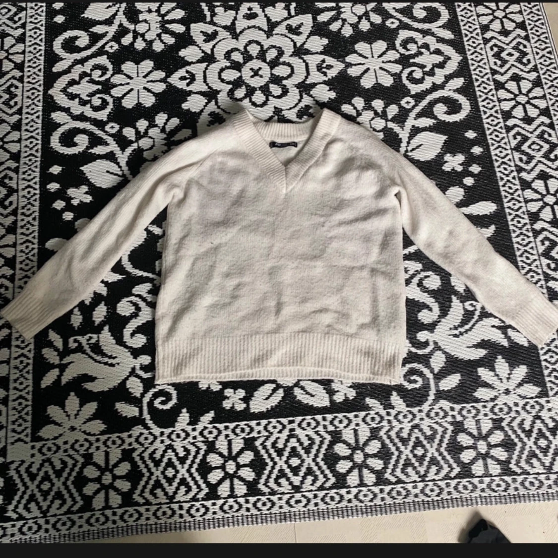 V-ringad tjocktröja