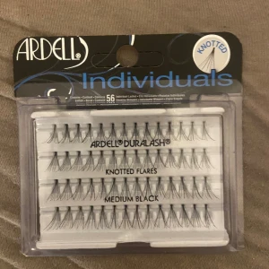 Singel fransar  - Ett packet med oöppnade singelfransar från ardell