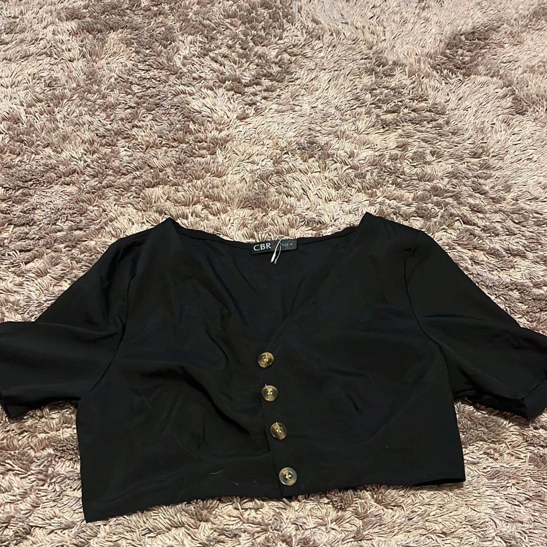 Svart bolerotopp från CBR