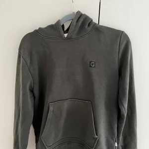 Hörn grunt hoodie - Barn:L Grön Hyfsat skick