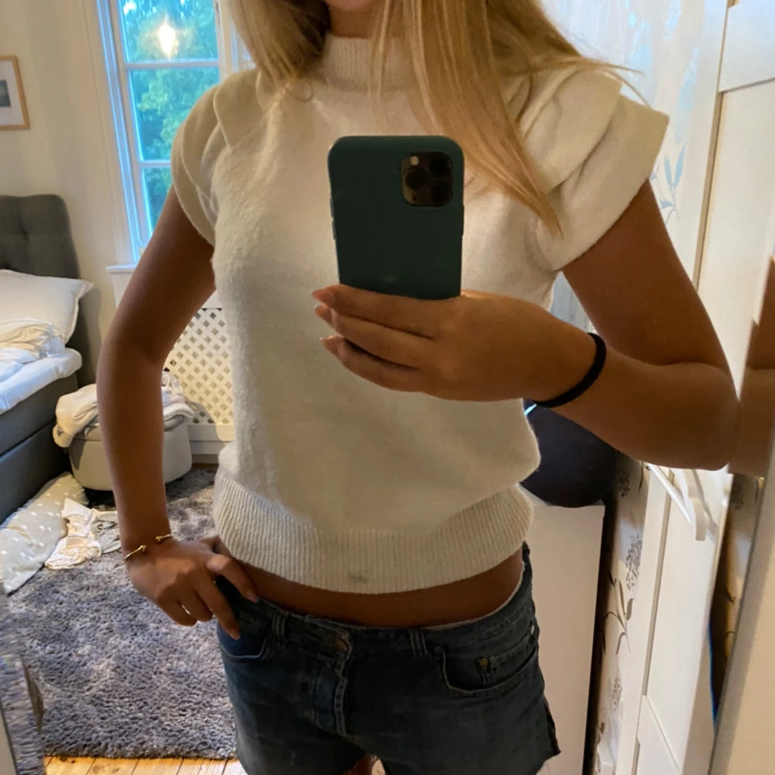 Stickad kortärmad blus