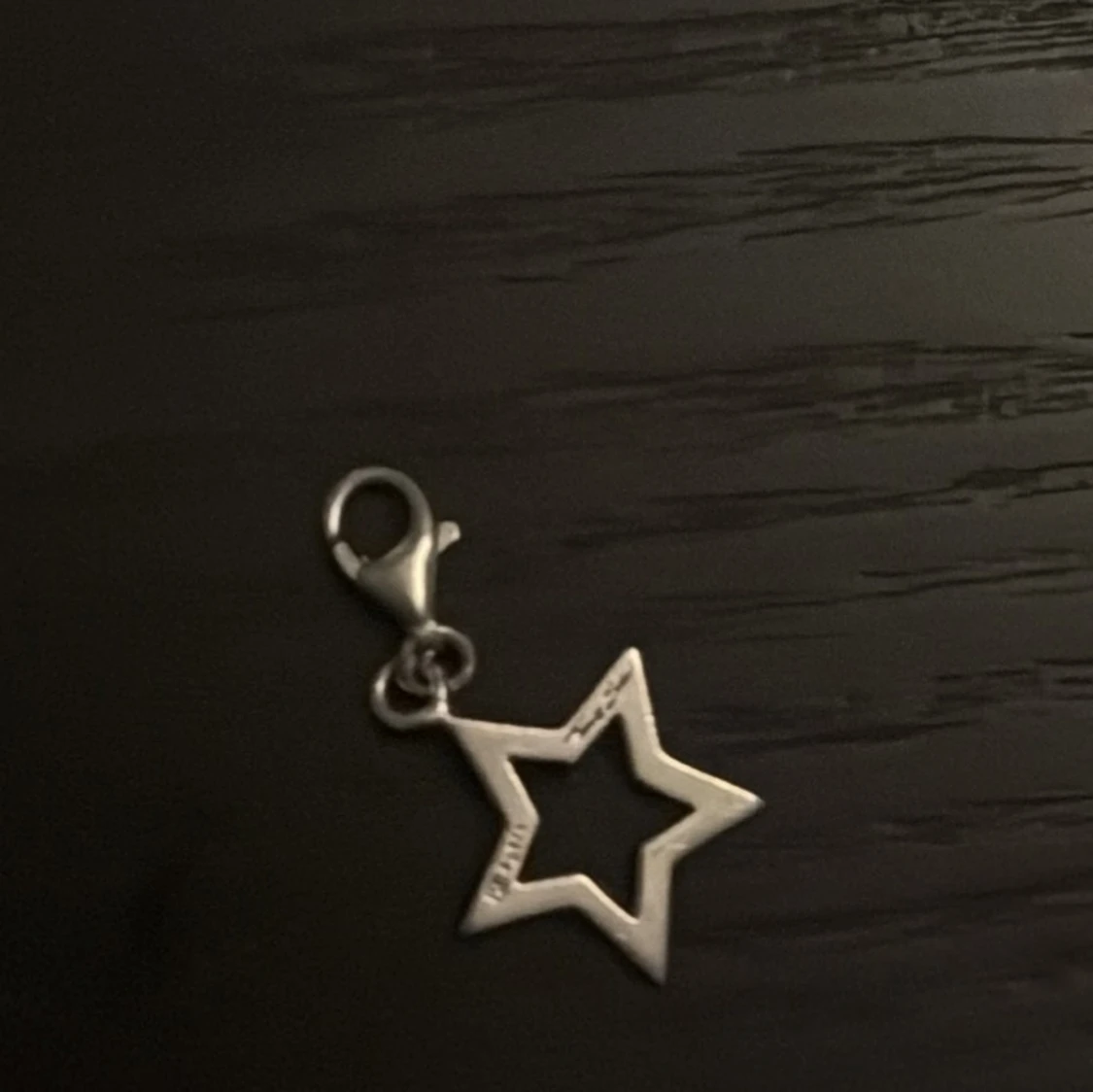 Silverfärgad stjärnberlock - 1