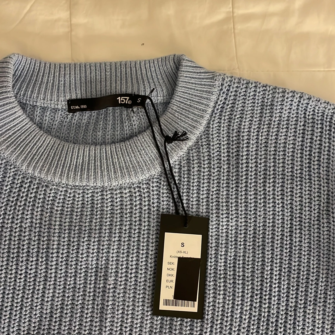 Blå stickad tröja  - 91