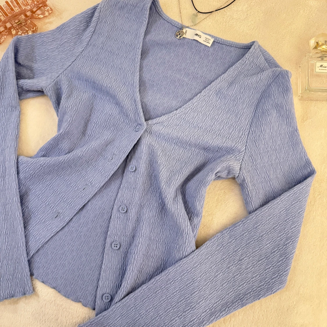 Ljusblå kofta från Mango