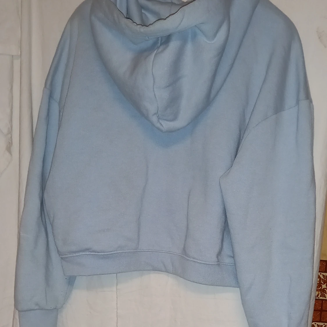 Ljusblå hoodie från 157 - 90