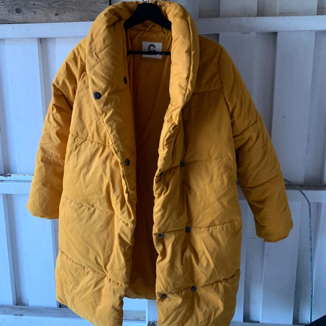 Gul lång vinter jacka från Cubus