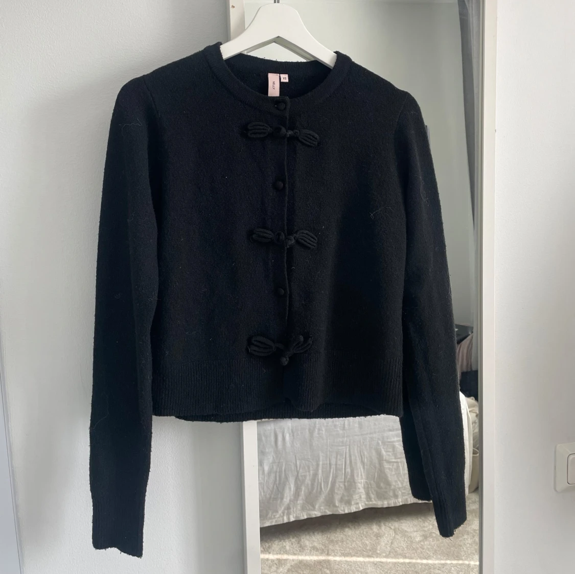 Långärmad kofta från Nelly